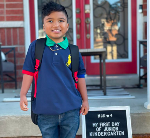 SickKids patient Maxen, smiles at the camera for his first day of school