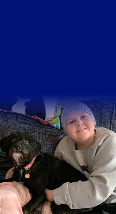 SickKids patient Sarah with her dog