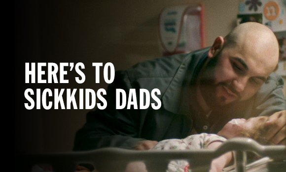 SickKids dad hugging child