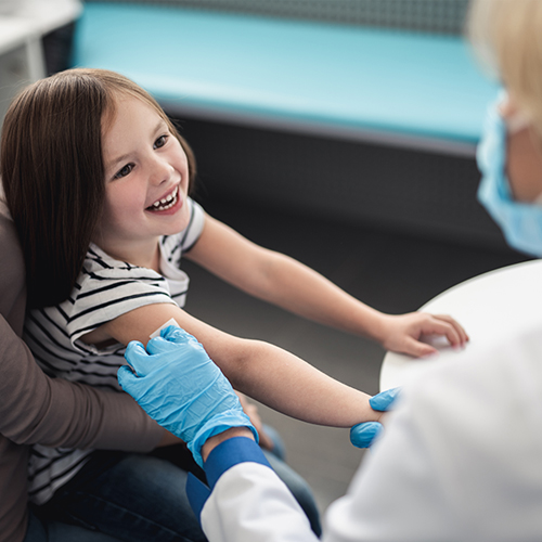 Young child getting ready to get an needle