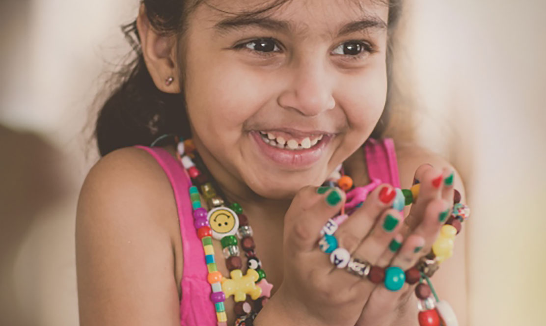 SickKids patient holding bravery beads