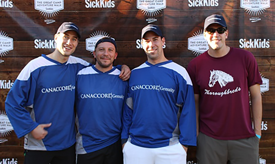 4 Guys in Canaccord Genuity team shirts