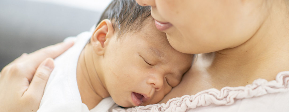 Child in his mothers arms