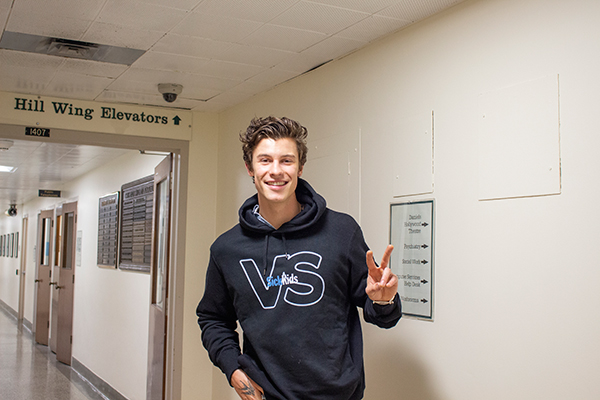 Shawn Mendes wearing a VS hoodie