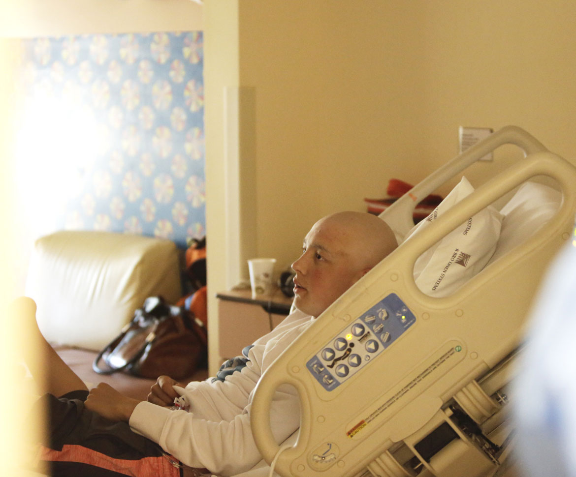 Boy in SickKids hospital bed