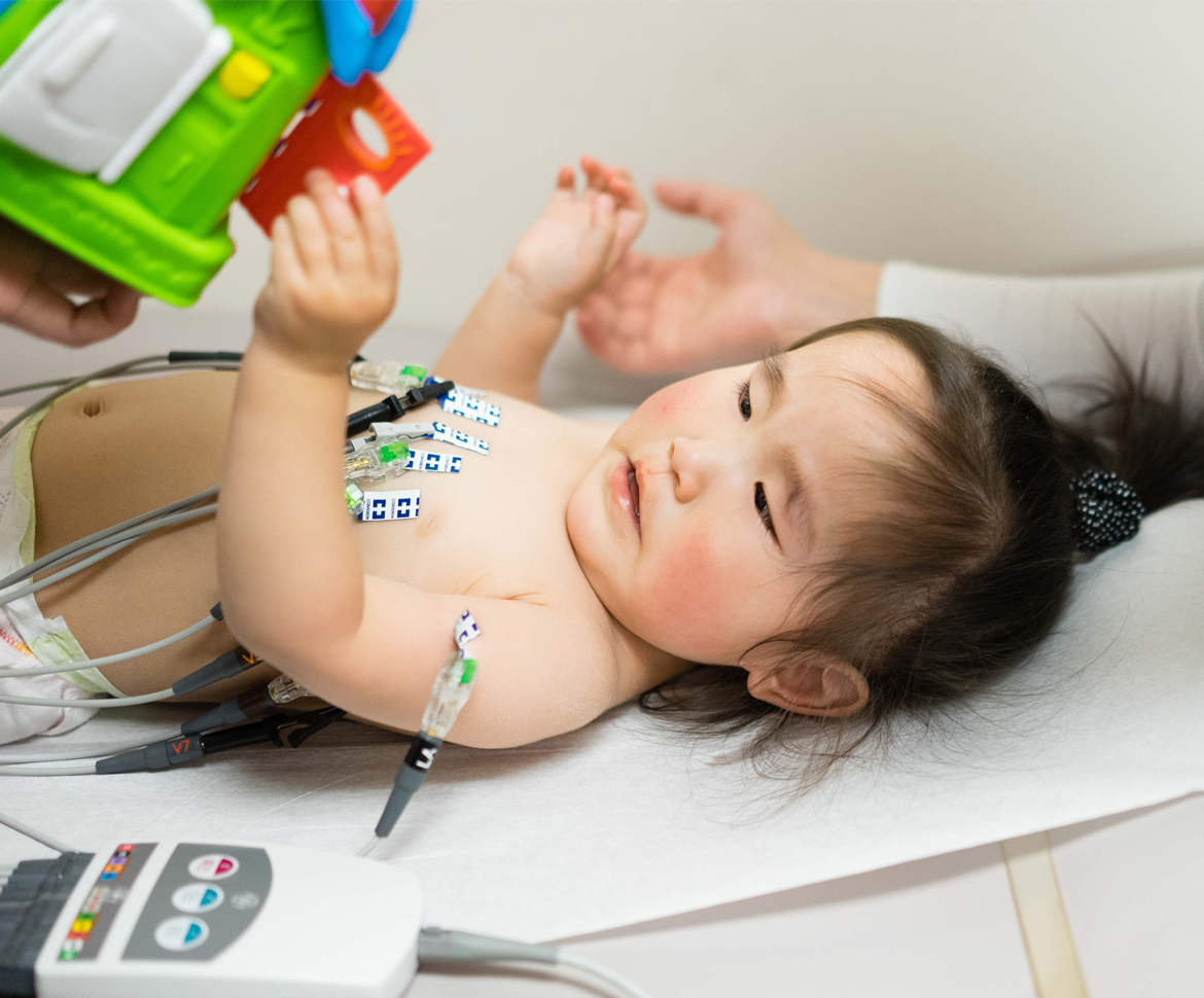 little girl on hospital bed