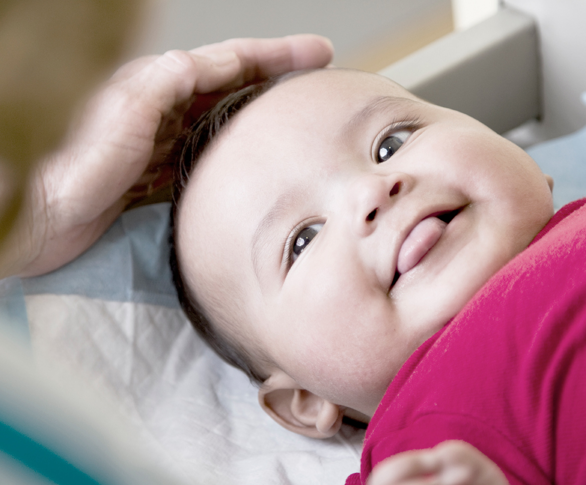 baby sticking tongue out